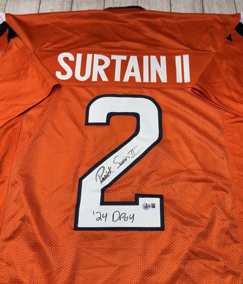 DENVER BRONCOS PATRICK SURTAIN II SIGNED CUSTOM ORANGE JERSEY “24 DPOY” BECKETT