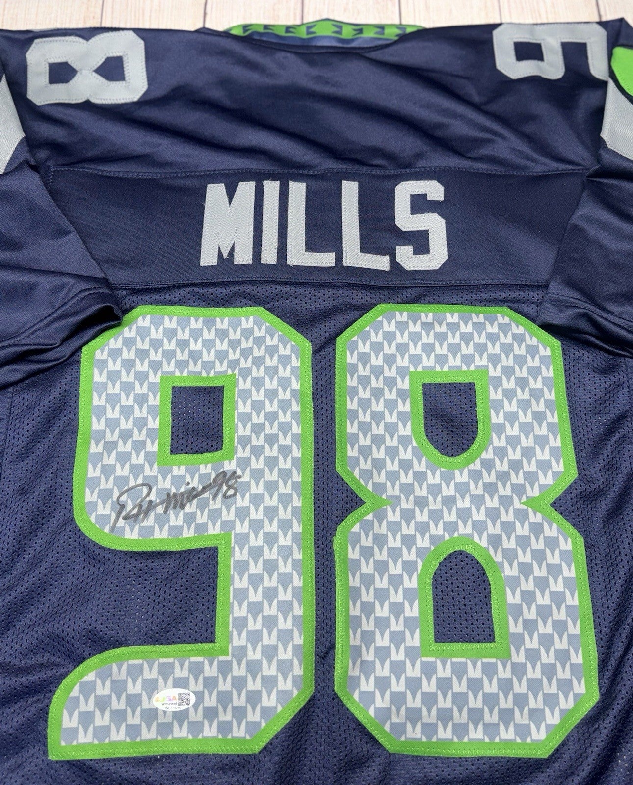 Rylie Mills signature detail on Seattle Seahawks blue custom jersey