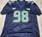 JSA certificate of authenticity for Rylie Mills autographed Seahawks jersey